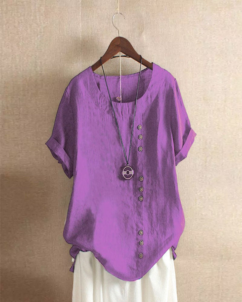 Kelly | Ensfarget kortermet bluse med rund hals