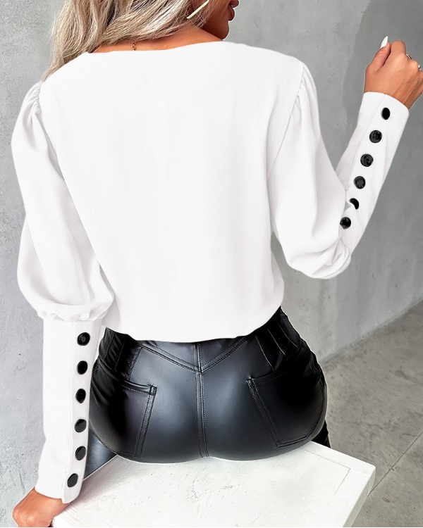 Valen | Damebluse med gigot-ermer med knapper