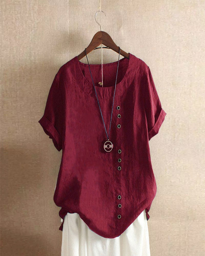 Kelly | Ensfarget kortermet bluse med rund hals