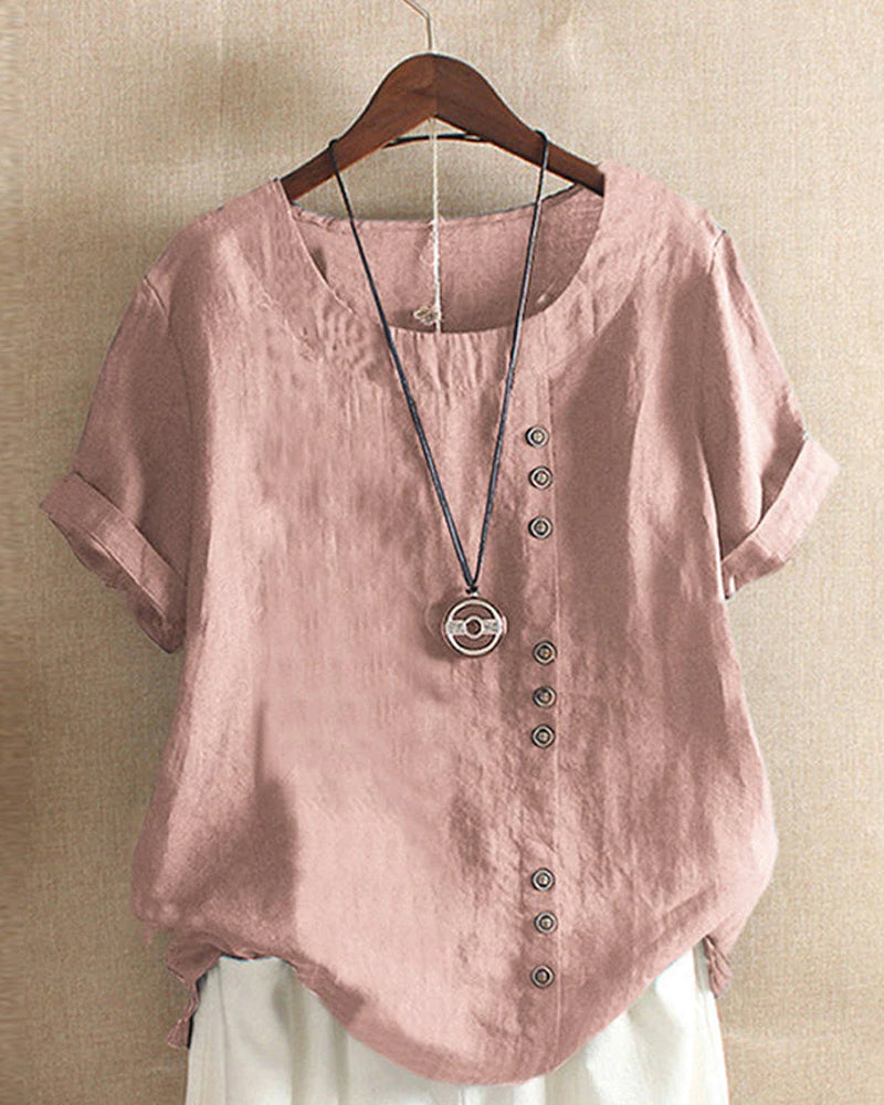 Kelly | Ensfarget kortermet bluse med rund hals