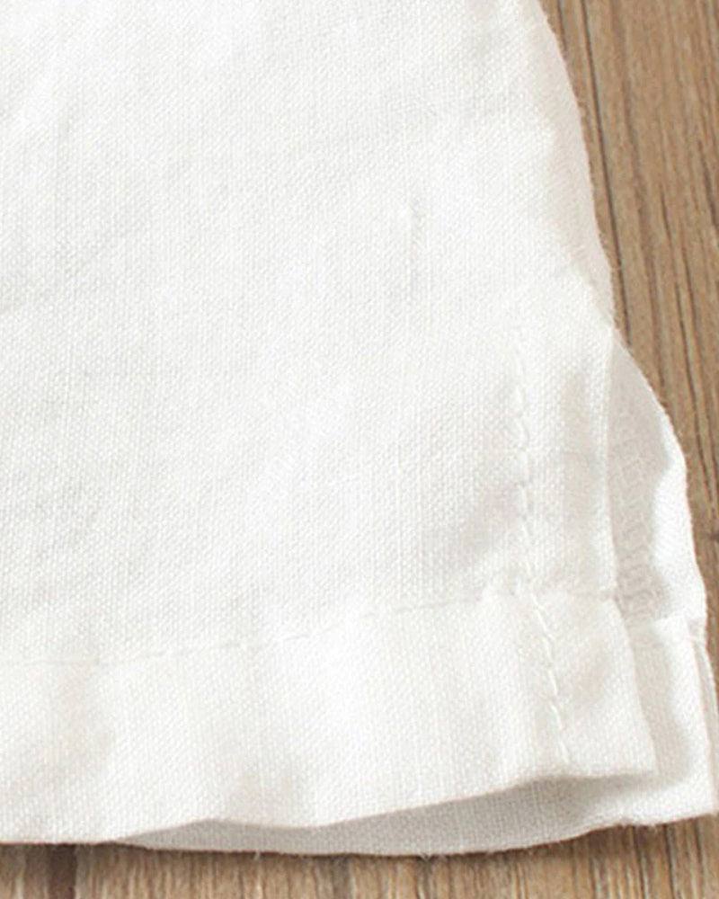 Kelly | Ensfarget kortermet bluse med rund hals