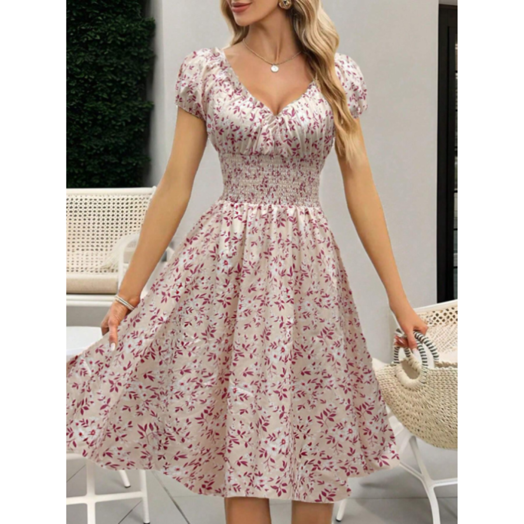 Freda | Kjole med blomsterprint og volanger